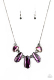 Paparazzi Cosmic Cocktail - Multi - Necklace  -  Featuring a UV shimmer, a glittery collection of raw cut iridescent gems delicately link with dainty hematite rhinestone dotted gunmetal teardrops below the collar, creating a stellar fringe. Features an adjustable clasp closure.
