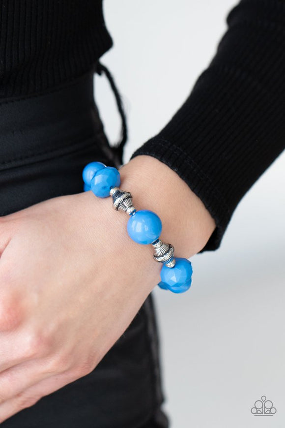 Paparazzi Day Trip Discovery - Blue - Bracelet  -  A collection of polished French Blue beads in smooth round and faceted shapes, are threaded along a stretchy band. Accents of silver beads etched in linear designs adds a down to earth finish to the whimsical bracelet.
