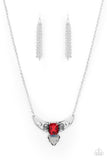 Paparazzi You the TALISMAN! - Red - Necklace  -  Pairs of faceted silver beads and glassy white emerald cut gems flank an oversized emerald cut red gem atop an antiqued silver half moon frame. A smoky triangular cut gem adorns the bottom of the pendant, creating a twinkly talisman at the bottom of a classic silver chain. Features an adjustable clasp closure.
