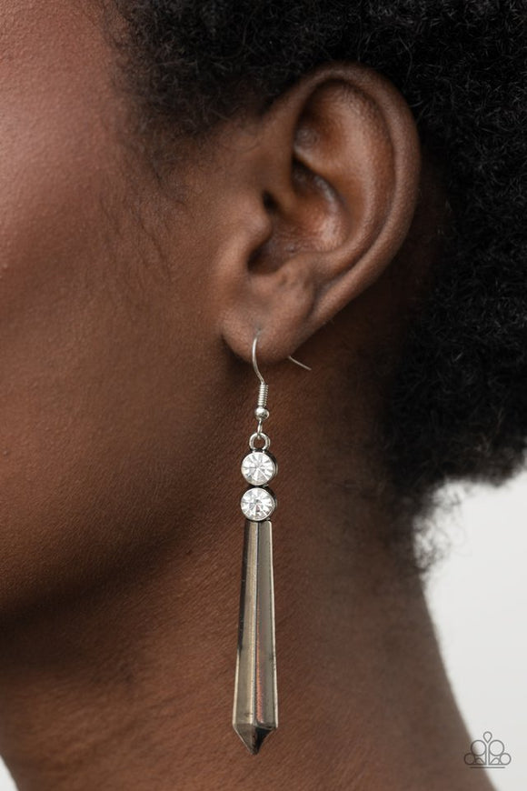 Paparazzi Sparkle Stream - White - Earrings  -  A pair of glittery white rhinestones crowns a flared silver rod, creating a sharp-looking lure. Earring attaches to a standard fishhook fitting.
