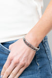 Paparazzi A Point Of Pride - Multi - Bracelet  -  Two glistening silver bars flank a row of black, red, and hematite rhinestones, coalescing into a dainty layered cuff around the wrist for a dash of refined edge.
