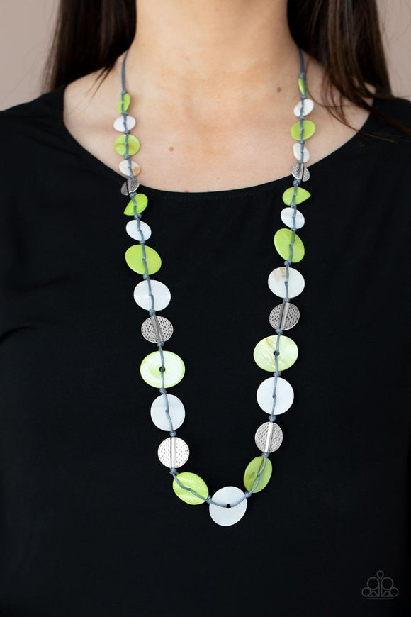 Paparazzi Seashore Spa - Green - Necklace  -  Infused with hammered silver discs, an assortment of green and white shell-like discs are knotted in place along a gray cord, creating a summery display across the chest. Features an adjustable clasp closure.
