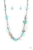 Paparazzi Seashore Spa - Blue - Necklace  -  Infused with hammered silver discs, an assortment of blue and white shell-like discs are knotted in place along a gray cord, creating a summery display across the chest. Features an adjustable clasp closure. 
