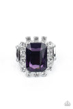Paparazzi Galactic Glamour - Purple - Ring  -  Featuring dainty silver square fittings, an explosion of glassy white rhinestones fans out from a dramatically oversized emerald cut purple rhinestone center, creating a stellar centerpiece atop the finger. Features a stretchy band for a flexible fit.
