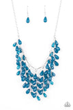 Paparazzi Garden Fairytale - Blue - Necklace  - 2021 Convention Exclusive  -  A shimmery collection of opaque and clear crystal-like Mykonos Blue teardrop beads delicately cluster along a linked strand of silver bars, creating an ethereally leafy fringe below the collar. Features an adjustable clasp closure.
