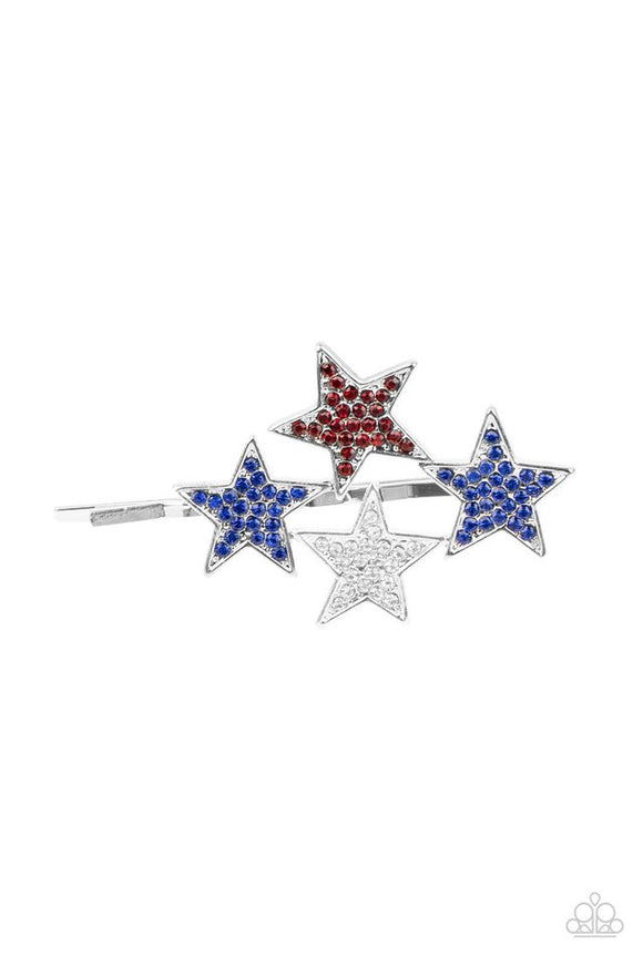 Paparazzi Stellar Celebration - Blue - Hair Clip  -  Dotted in red, white, and blue rhinestones, an explosion of stars adorns the front of a silver bobby pin for a stellar patriotic shimmer.
