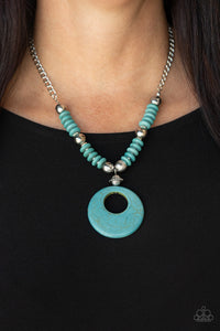 Paparazzi Oasis Goddess - Blue - Bracelet  - 2021 Convention Exclusive  -  Infused with dainty silver accents, mismatched silver beads and turquoise stone discs are threaded along an invisible wire below the collar. An oversized turquoise stone pendant swings from the center of the earthy strand, creating a bold pop of seasonal inspiration. Features an adjustable clasp closure.
