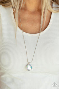 Paparazzi Instant Icon - Multi - Necklace  -  An oversized iridescent gem is pressed into the center of a sleek silver fitting, creating a mesmerizing statement piece at the bottom of a sleek silver chain. Features an adjustable clasp closure.
