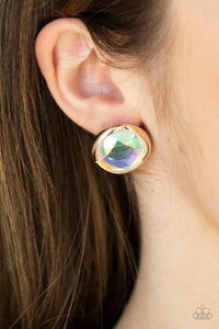 Paparazzi Double-Take Twinkle - Gold - Earrings  -  Featuring a flashy faceted finish, an oversized iridescent gem is pressed into a sleek gold fitting for a dramatic pop of dazzle. Earring attaches to a standard post fitting.
