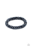 Paparazzi Wake Up and Sparkle - Blue - Bracelet  -  Sparkling with dramatic brilliance, a collection of dainty faceted blue beads are threaded along a woven stretchy band creating a stunning statement around the wrist.
