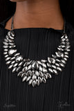Paparazzi The Tanisha - Necklace  -  A smoldering collection of oversized teardrop and marquise cut hematite rhinestones daringly fan out from the collar, coalescing into intense interconnected frames. The dauntless display of dazzle locks in place, creating a stunningly solitaire sparkle. Features an adjustable clasp closure.
