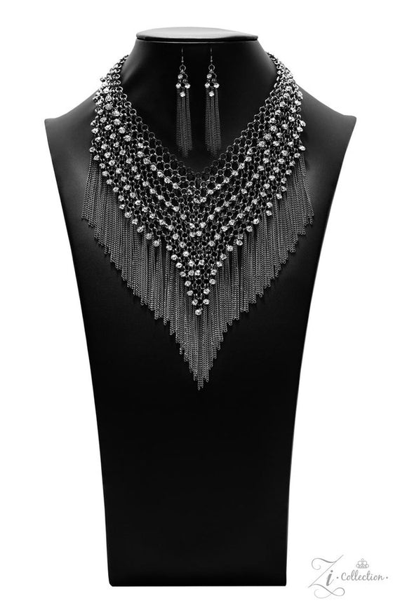 Paparazzi Impulsive - 2021 Zi Signature Collection  -  Row after row of blinding white rhinestones trickle from a seemingly infinite collection of bold gunmetal links that interlock into an intensely tapered metallic net down the chest. Gritty gunmetal chains stream from the bottom of the glamorously grunge statement piece, adding hypnotic movement to the fearless attitude of this main attraction. Features an adjustable clasp closure.
