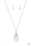 Paparazzi Demandingly Diva - White - Necklace  -  Capped in a white rhinestone encrusted fitting, glittery silver ribbons of white rhinestones delicately wrap around the top of a dramatically oversized white teardrop gem. The dazzling pendant swings from the bottom of a lengthened silver chain, creating a glamorous statement piece. Features an adjustable clasp closure.
