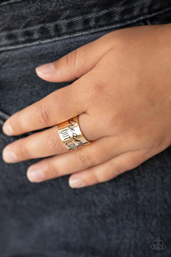 Paparazzi Dream Louder - Gold - Ring  -  The front of a thick gold band is stamped in the phrase, 