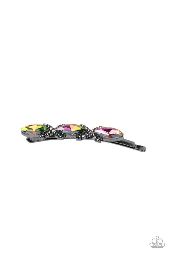 Paparazzi Stellar Socialite - Multi - Hair Clip  -  Crisscrossed ribbons of smoky hematite rhinestones separate a trio of oil spill marquise cut gems across the front of a classic gunmetal bobby pin for a stellar fashion.
