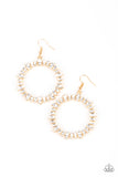 Paparazzi Glowing Reviews - Gold - Earrings  - 2021 Convention Exclusive  -  Encased in gold pronged fittings, an incandescent array of white marquise cut rhinestones delicately coalesce into a glowing hoop. Earring attaches to a standard fishhook fitting.

