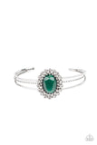 Paparazzi Prismatic Flower Patch - Green - Bracelet  -  Bordered in glitzy rings of glittery white rhinestones and shiny silver studs, a faceted Leprechaun gem adorns the center of an ornately layered silver cuff for a flowery fashion.
