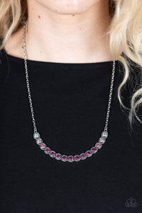 Paparazzi Throwing SHADES - Pink - Necklace  -  Encased in studded silver fittings, a glittery ombre of pink rhinestones delicately bows below the collar, creating an enchanting pop of color. Features an adjustable clasp closure.
