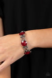 Paparazzi Devoted to Drama - Red - Bracelet  -  Featuring edgy chain-like fittings, a sparkly series of oversized red rhinestones are threaded along stretchy bands around the wrist for a dramatic pop of glitz.
