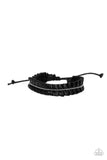 Paparazzi Hard to PLEATS - Black - Bracelet  -  Infused with a dainty strand of silver ball chain, a ribbon of black leather gathers into a pleated bracelet around the wrist for a rustic flair. Features an adjustable sliding knot closure.
