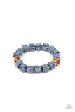 Paparazzi Glaze Craze - Blue - Bracelet  -  Featuring distressed blue and brown glazed finishes, a rustic collection of ceramic cube beads are threaded along stretchy bands around the wrist for a colorful flair.
