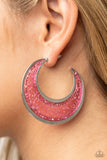 Paparazzi Charismatically Curvy - Pink - Earrings  -  Flecked in silver shavings, a glistening pink acrylic half moon frame is bordered with flat shiny bars that coalesce into a curvaceous hoop. Earring attaches to a standard post fitting. Hoop measures approximately 2" in diameter.
