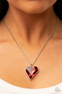 Paparazzi Lockdown My Heart - Red - Necklace  -  A shimmering red heart-shaped gem is pressed into a simple silver frame at the end of a silver box chain creating an adorable sentiment below the collar. Features an adjustable clasp closure.
