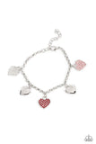 Paparazzi Lusty Lockets - Multi - Bracelet  -  Shiny silver heart charms delicately alternate with white, red, and pink rhinestone encrusted heart frames along a silver chain around the wrist, resulting in a flirtatious fringe. Features an adjustable clasp closure.
