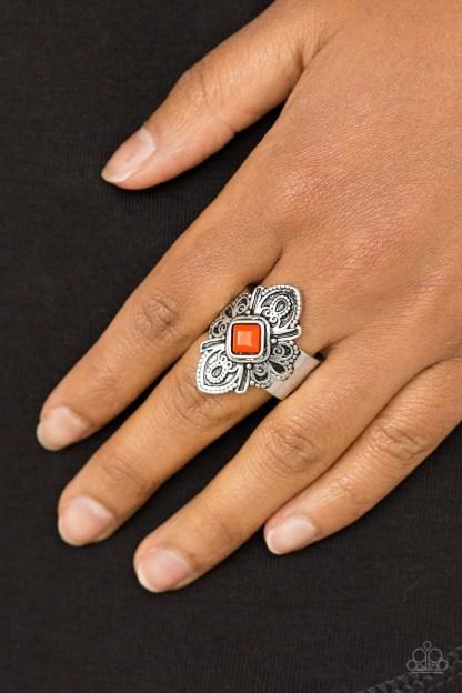 Paparazzi Impressive TREK Record - Orange An orange square bead is pressed into the center of a scalloped silver frame radiating with tribal inspired detail for a seasonal look. Features a stretchy band for a flexible fit.
