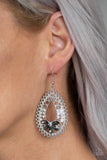 Paparazzi Instant REFLECT - Silver - Earrings
Studded filigree swirls into a frilly teardrop frame. Infused with glassy white rhinestones, smoky marquise-shaped rhinestones are pressed into a whimsical floral shape for a refined flair. Earring attaches to a standard fishhook fitting.
