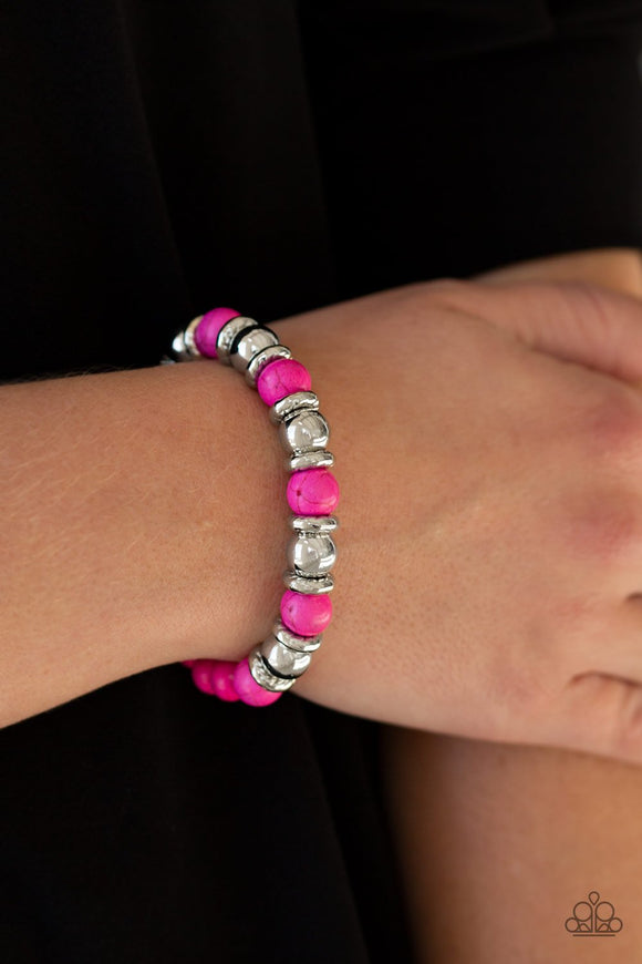 Paparazzi Across The Mesa - Pink - Bracelet
A collection of silver accents and vivacious pink stones are threaded along a stretchy band for a seasonal look.
