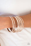 Paparazzi Am I BRIGHT - Gold - Bracelet
Featuring smooth and textured finishes, a collection of mismatched rose gold bangles stack across the wrist for a classic look.