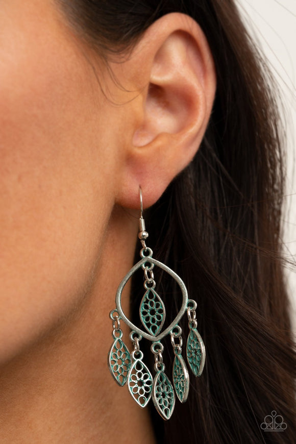 Paparazzi Artisan Garden - Silver - Earrings
Brushed in a patina finish, dainty floral silver frames swing from the bottom and top of an airy silver frame, creating a rustic fringe. Earring attaches to a standard fishhook fitting.