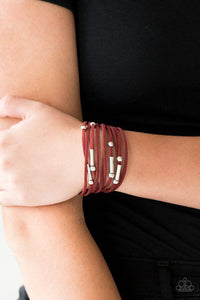 Paparazzi Back To Backpacker - Red - Bracelet
Strung between two silver fittings, glistening silver and gunmetal accents slide along strands of red suede for a seasonal look. Features an adjustable clasp closure. 
