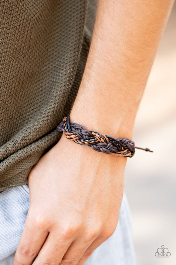 Paparazzi Badlands Wanderer - Brown - Bracelet
Infused with leather accents, mismatched strands of black, tan, and brown cording weave across the wrist, creating an earthy braid. Features an adjustable sliding knot closure.
