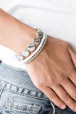 Paparazzi Beyond The Basics - White - Bracelet
Mismatched silver and white beads and round silver accents are threaded along stretchy bands, creating colorful layers around the wrist.
