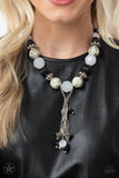Paparazzi Blockbuster Break A Leg! - Black - Necklace
Smooth beads with a marbleized black and white swirl alternate with milky white and silver accents. A tassel of chains in various lengths is decorated with black, silver, and frosty pieces. Features an adjustable clasp closure.