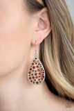 Paparazzi Call Me Ms. Universe - Brown - Earrings
Hints of silver and glittery rhinestones collect inside an airy silver teardrop frame, creating a gorgeous lure. Earring attaches to a standard fishhook fitting. 
