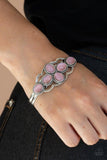 Paparazzi Color Me Celestial - Pink - Bracelet
A collection of glowing pink cat's eye stones delicately cluster inside a scalloped silver frame, creating an ethereal centerpiece atop a dainty silver cuff.