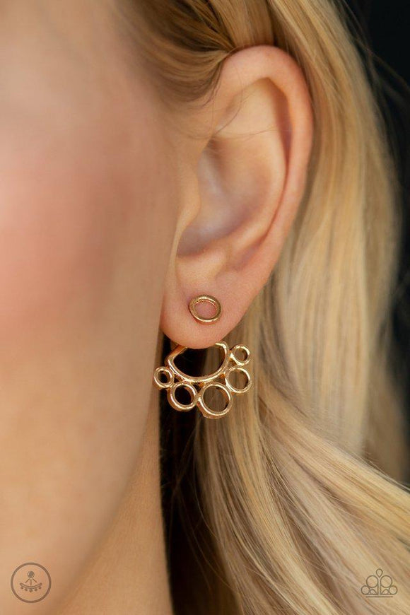 Paparazzi Completely Surrounded - Gold - Earrings
A dainty gold ring attaches to a double-sided post, designed to fasten behind the ear. Infused with a bubbly circular fringe, the airy double sided-post peeks out beneath the ear for a trendy finish. Earring attaches to a standard post fitting. 