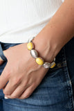 Paparazzi Decadently Dewy - Yellow - Bracelet
Bubbly yellow beaded frames and textured silver caps alternate along stretchy bands around the wrist, adding a colorful pop of color.