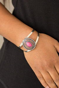 Paparazzi Deep In The TUMBLEWEEDS - Pink - Bracelet
Featuring a vivacious pink stone center, an ornate silver frame sits atop an airy silver cuff for a seasonal look. 
All jewelry is Lead &amp; Nickel Free!