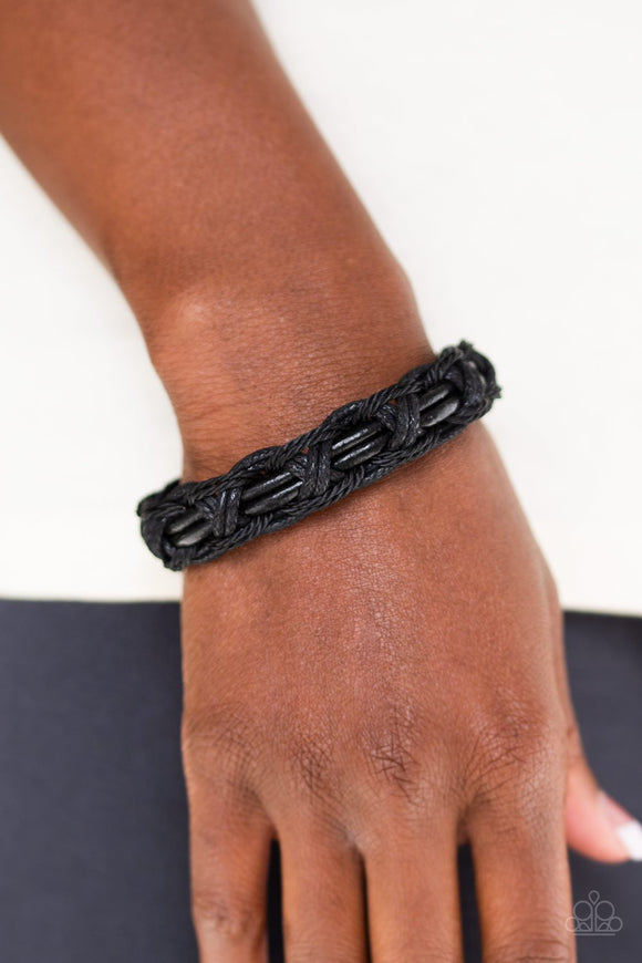 Paparazzi Don't WEAVE Me Hanging - Black - Bracelet
Strands of black cording ornately weave around black leather cords, creating an earthy braid. Features an adjustable sliding knot closure.
