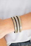 Paparazzi Fashion Fanatic - Gold - Bracelet
Rows of flat gold discs, glassy white rhinestones, and shimmery gold chains are encrusted along black suede bands for a sassy look. Features an adjustable snap closure.
