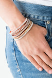 Paparazzi Fashion Fiend - Orange - Bracelet
Glassy white and smoky rhinestones are encrusted along strands of orange suede. Glistening silver and gold chains are added to the bands, adding edgy industrial shimmer to the sassy palette. Features an adjustable snap closure.
