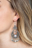 Paparazzi Fiesta Flair - Silver - Earrings
Swirling with vine-like filigree, ornate silver frames delicately link into a stacked frame. Infused with shiny gray beads, the whimsical frame gives way to a fringe of glistening silver discs for a playful flair. Earring attaches to a standard fishhook fitting.