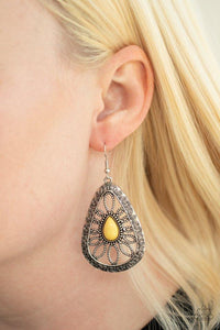 Paparazzi Floral Frill - Yellow - Earrings  A yellow bead is pressed into the center of an oversized ornate silver teardrop frame studded and embossed in swirling filigree detail for a whimsical look. Earring attaches to a standard fishhook fitting.