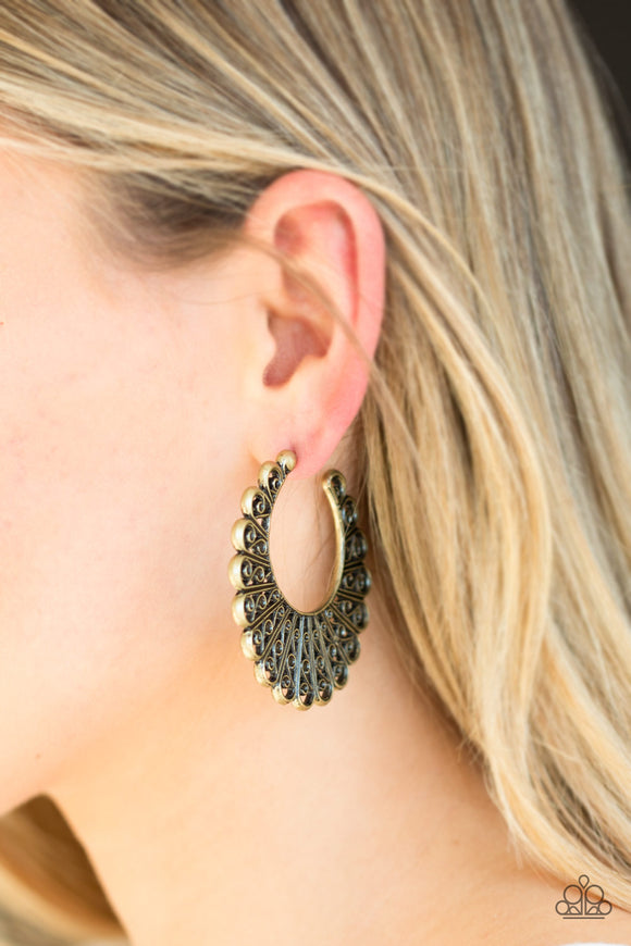 Paparazzi Funky Flirt - Brass - Earrings
Brushed in an antiqued shimmer, filigree filled petals curve into a whimsical hoop. Earring attaches to a standard post fitting. Hoop measures 2