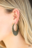 Paparazzi Funky Flirt - Brass - Earrings
Brushed in an antiqued shimmer, filigree filled petals curve into a whimsical hoop. Earring attaches to a standard post fitting. Hoop measures 2" in diameter.