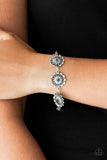 Paparazzi Funky Flower Child - Blue - Bracelet
Dotted with blue rhinestone centers, ornate silver floral frames link across the wrist for a seasonal look. Features an adjustable clasp closure.

